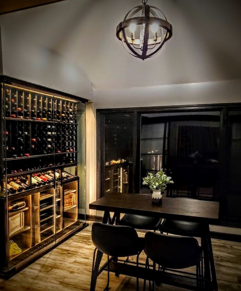 chic wine cellar with table chairs
