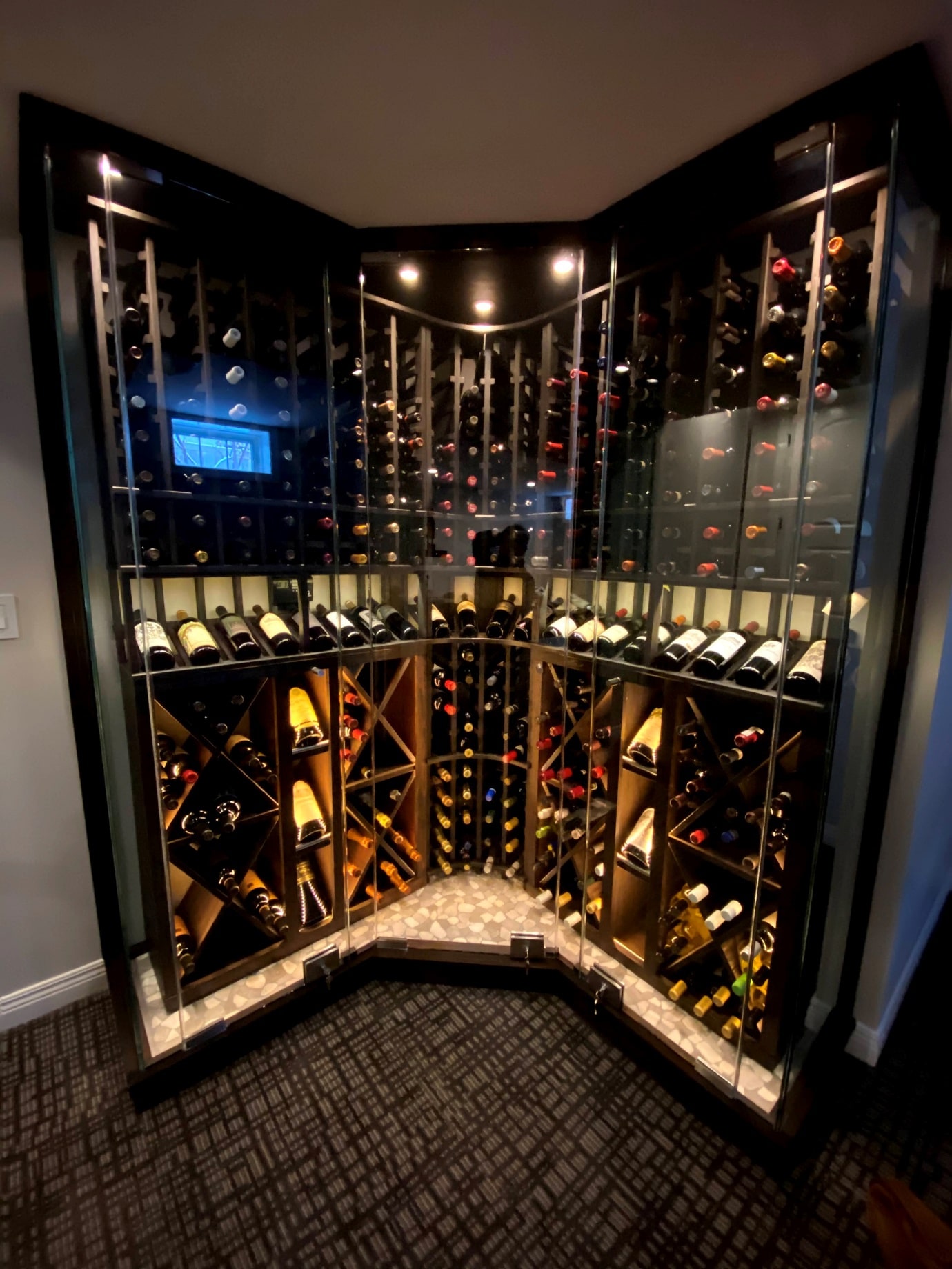 Wine bottles on shelves